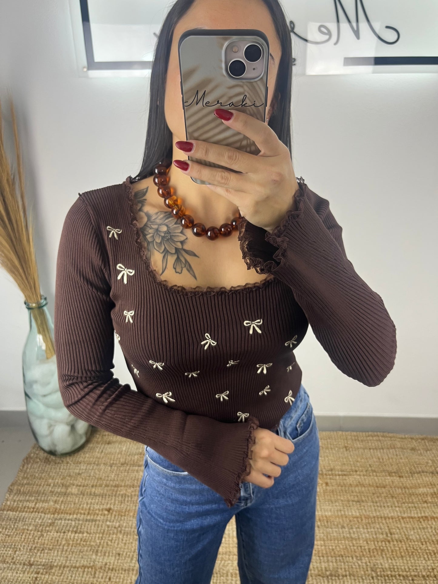 Malha laços e folhos